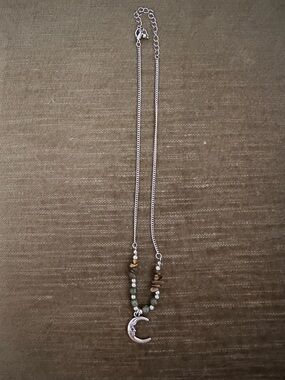 Ladies/Unisex moon necklace with stones and beads silver toned